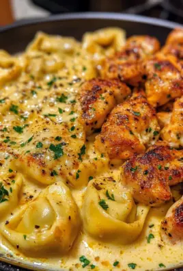 Velvety Cajun Chicken Tortellini with Three-Cheese Sauce